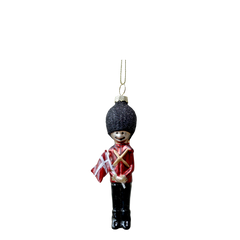 Soldier w. flag H11/L4/W2.5 cm antique cherry